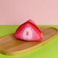 Cute plush strawberry wedge coin purse with red zipper on a wooden display tray - Strawberry Triangle Coin Purse / Approximately 815cm