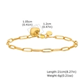 Vista detallada de pulsera con dije de corazón con dimensiones y cadena de clip - Dorado