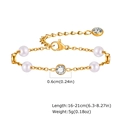Detailansicht eines Goldperlenarmbands mit Zirkonia und verstellbarem Karabiner - Gold