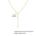 Detalle de collar en Y dorado con colgante de corazón hueco y perla de gota blanca - Dorado