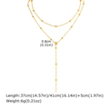 Detailed view of golden double-layer Y-shaped necklace with bead chain and flower pendant - Flower Pendant (NC-2396G03) / Gold