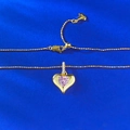 S925 silver heart necklace with pink sapphire zirconia on a deep blue silk background - 925 Silver / Pink Heart Pendant Necklace