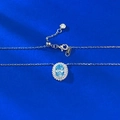 Elegante collana in argento S925 con ciondolo ovale in pietra azzurra e alone di diamanti - Argento 925 / Celeste