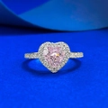 Elegant S925 silver ring featuring a heart-cut pink diamond with shimmering halo and pavé band - US 5 / Pink