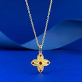 Golden S925 silver four-leaf clover necklace with red zircons on deep blue silk background - Clover Necklace / 925 Silver / Gold