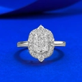 Vintage style radiant cut silver ring with pavé halo on royal blue background - US 5 / Silver (White Zirconia)