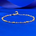 Detailed macro view of S925 silver gold-plated star bracelet with faceted beads and clasp - Adjustable Pull-out / Gold