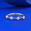Minimalist S925 sterling silver ring featuring four sparkling round cubic zirconia stones - US 5 / Silver