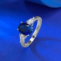 Elegant 925 sterling silver ring with oval blue sapphire and pear-shaped side stones - US 5 / Silver Blue Corundum Ring