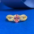 S925 silver oval pink gemstone ring with bow-shaped pavé accents on gold finish - US 5 / Padparadscha Pink
