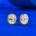 Classic S925 silver oval stud earrings with bezel-set stones on a blue background - 925 Silver / Gold Oval Style (E612)