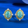 Pendientes vintage de opale azul con montura dorada y diamantes sobre fondo azul - Plata 925 / Azul Ópalo (E602)