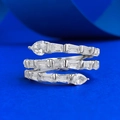 Three-layer silver snake ring with sparkling pear-cut cubic zirconia on blue silk background - US 6 / White Zirconia Pave Snake Style (R1291)