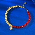 S925 Silber vergoldetes Armband mit roten Katzenaugenperlen und Zirkonia auf blauem Grund - Verstellbar / Rot