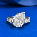 Pear cut S925 silver ring with teardrop gemstone and side diamonds on blue background - US 6 / Pear Shaped Ring (R1345)