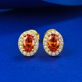 Eleganti orecchini a lobo in argento 925 dorato con gemma ovale arancione e halo - Forma geometrica ellittica / Arancione Fanta