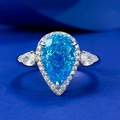 Pear cut blue aquamarine silver ring with halo setting and side teardrop stones - US 5 / Aquamarine