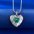 Macro view of heart-cut green gemstone pendant with S925 silver star-studded frame - 925 Silver / Paraiba Heart Necklace (Green)