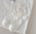 White ribbed crew socks for women featuring ruffle trim and decorative side buttons - One Size / Double Buttons