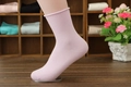 Pink rolled cuff cotton socks for women, minimalist mid-calf style on foot model - One Size / Purple Pink