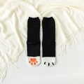 Gemütliche Katzenpfoten-Schlafsocken aus Korallenvlies in Schwarz-Weiß mit Tatzen - Einheitsgröße / Glatt Schwarz
