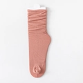Slouchy coral pink velvet socks with ribbed texture and folded design on white background - One Size / Dusky Pink