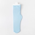 Sky blue velvet slouch socks with vertical ribbed texture and a white retail tag - One Size / Light Blue