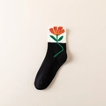 Casual black and white mid-calf cotton socks featuring bright orange floral embroidery - One Size / Black With Red Flowers