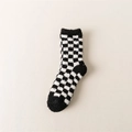 Warm black and white checkerboard coral fleece crew socks with soft plush texture - One Size / Checkered