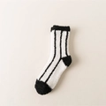 Warm coral fleece crew socks in white with black vertical stripes and heel accents - One Size / Vertical Stripes