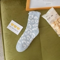 Light blue coral fleece winter socks with white leopard patterns for home comfort - One Size / Light Blue
