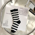 Classic black and white horizontal striped crew socks with ribbed cotton texture - One Size / Black & White Stripes