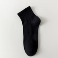Men's solid black breathable cotton ankle socks with elastic ribbed cuffs and arch support - One Size / Black
