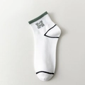 White low-cut cotton sports sock with green ribbed cuff and embroidered letter M detail - Letter M Embroidery White Style (zy2312)