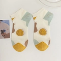 Bamboo mesh boat socks in cream with blue accents and a yellow smiley face pattern - One Size / Color Block Smile (23059)