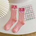 Chaussettes mi-mollet en coton rose avec motif cœur et texture en tricot côtelé - Taille unique / Rose