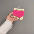 Fuchsia pink bikini pantyhose displayed on yellow cardboard packaging held by hand - One Size / Rose Red