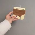 Brown knit bikini pantyhose in original retail packaging with yellow cardboard insert - One Size / Caramel