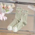 Calze a rete verde salvia da donna con bordi a balze bianchi e ricami di rose rosa - Taglia unica / Fiore Verde