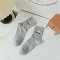 Light grey cotton mid-calf socks featuring mountain embroidery and dream lettering - One Size / Light Gray