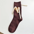 Dark brown ribbed mid-calf knit socks featuring a heart leather patch and cream lace-up bow - One Size / Dark Khaki