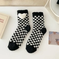 Thick coral fleece socks with black white checkerboard pattern and plush heart detail - One Size / Black