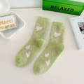 Light green mink velvet socks featuring white heart patterns in a cozy plush finish - One Size / Heart