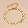 Pulsera de acero inoxidable dorado con corazones de esmalte blanco y cierre de langosta - Estilo de Corazón Blanco (1899GW)