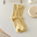 Calcetines amarillo pálido de algodón con punto elástico y una etiqueta blanca minimalista - Talla única / Amarillo Leche