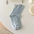 Calcetines de algodón azul claro con textura de canalé y etiqueta tejida de diseño - Talla única / Azul Leche