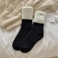 Dicke Thermo-Haussocken aus Wolle in Schwarz-Weiß aus weichem Plüschfleece - Einheitsgröße / Schwarz
