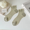Calcetines de mujer verde claro en punto de canalé suave con bordes de volantes elegantes - Talla única / verde claro