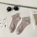 Calze a rete beige da donna con eleganti perline decorative e bordo a volant - Taglia unica / Grigio