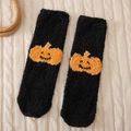 Halloween fluffy black socks with orange pumpkin pattern on white knit background - One Size / Black